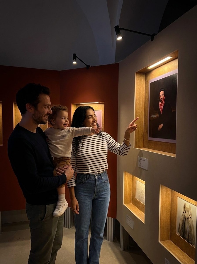 Visitors discovering their portrait in the Portrait Bureau gallery