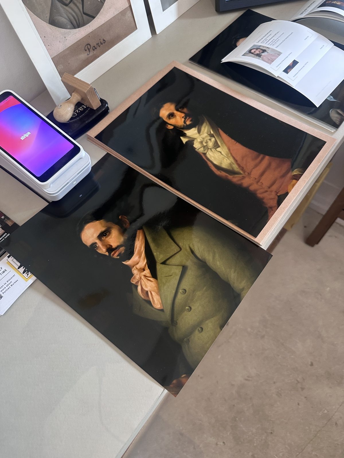 Fresh prints laid out on the table in the shop